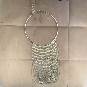 Necklace silver in color